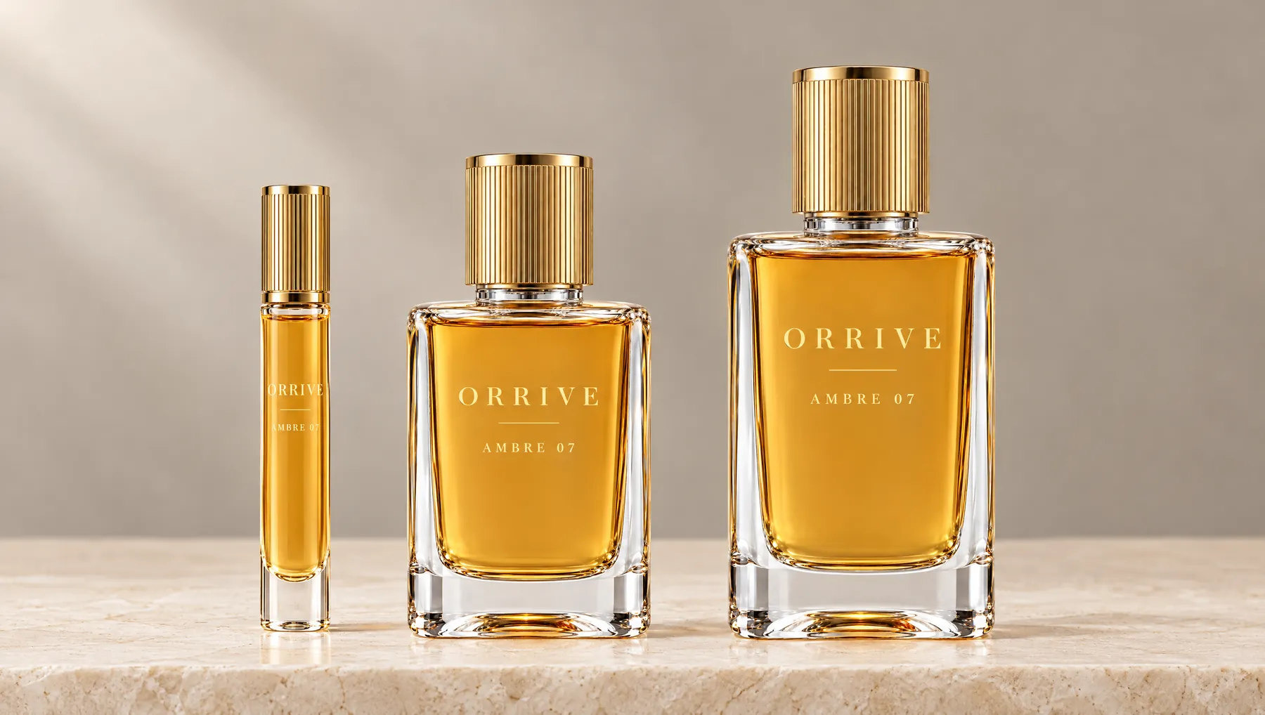 Three Orrive bottles side by side: the 10 ml travel spray, the 50 ml and the 100 ml.